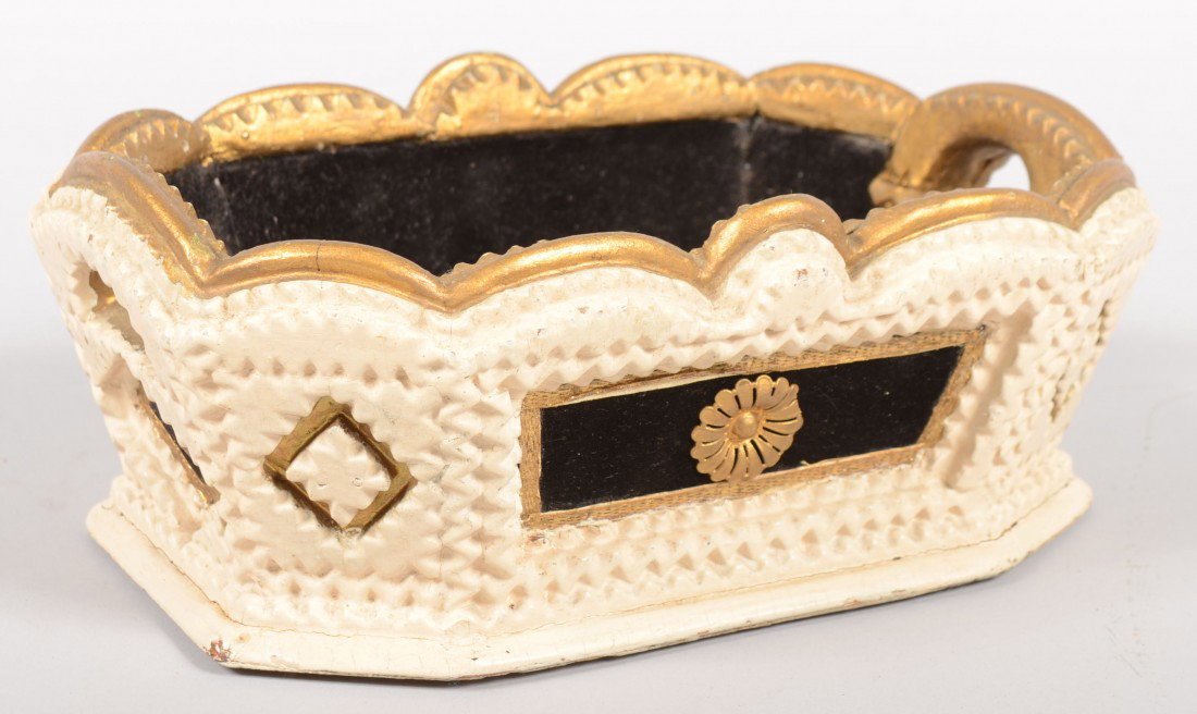 White Painted Open Hexagonal Cache Pot. Recessed d: White Painted Open Hexagonal Cache Pot. Recessed diamond shaped decorations on sides with some velvet lining and gold trim. Ends of box have pierced handles and along with edging are painted gold. Int