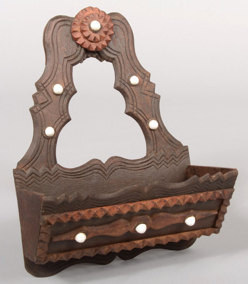Tramp Art Wall Pocket. Scallop shaped back boards : Tramp Art Wall Pocket. Scallop shaped back boards with incised contoured lines and two layer chip carved rosette finial. Support a canted front box with scalloped edges and incised contoured lines wit