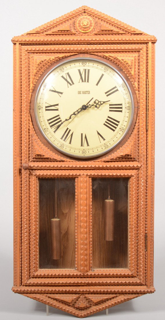 Tramp Art Style Clock Case with Electric Works. Ch: Tramp Art Style Clock Case with Electric Works. Chip carved strips outline and fill sides and face of case with layered triangular spandrels at clock face bezel. Also triangular shaped pediment with r