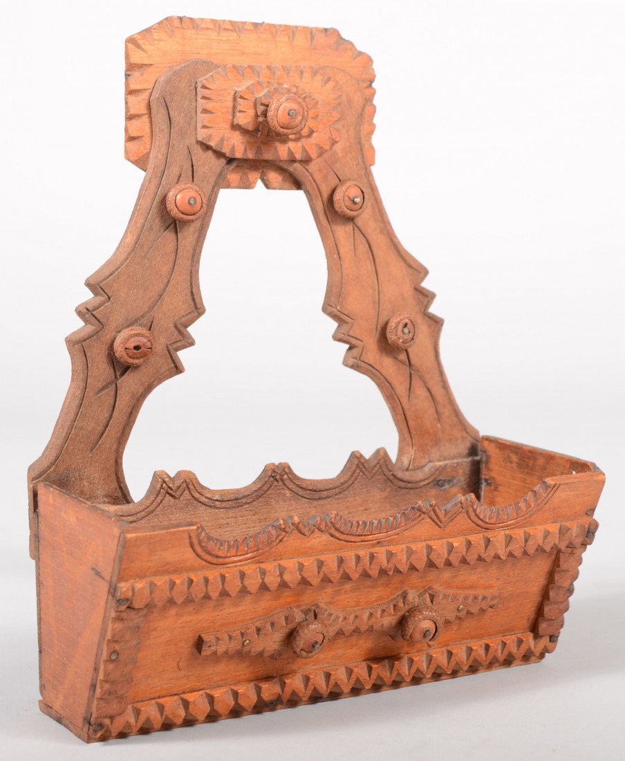 Tramp Art Wall Pocket. Scallop shaped back boards : Tramp Art Wall Pocket. Scallop shaped back boards with incised contoured lines and five layer chip carved rosette finial. Support a canted front box with scalloped edges and incised contoured lines wi