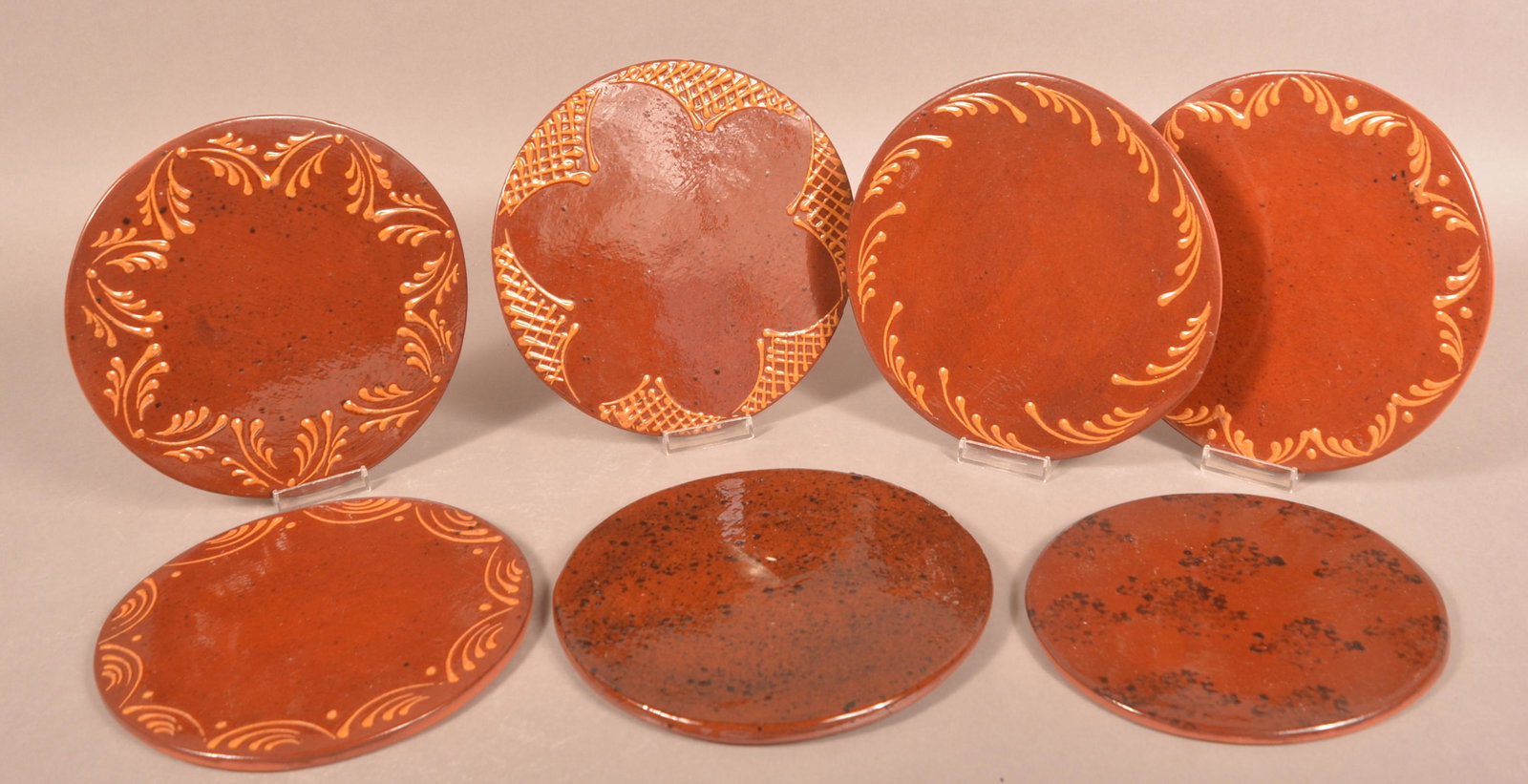 (7) Foltz Redware Slip Decorated Trivets (1 of 2)