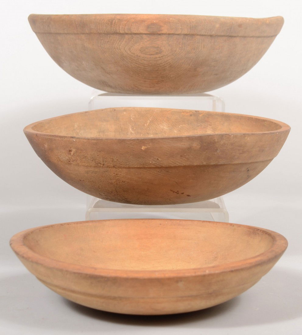 28 Three Turned Wooden Mixing Bowls. All with rim shou