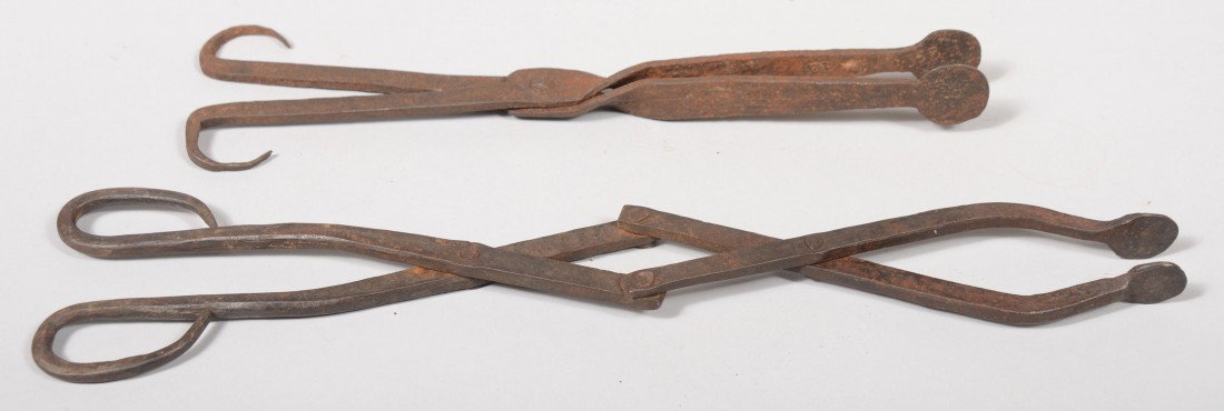 Two Wrought Iron Ember Tongs. Scissor type with op: Two Wrought Iron Ember Tongs. Scissor type with open finger rings and penny tips, 12 3/4"l. Along with an extension scissor type with double hinges, closed loop finger rings and penny tips, 16 3/4"l. 