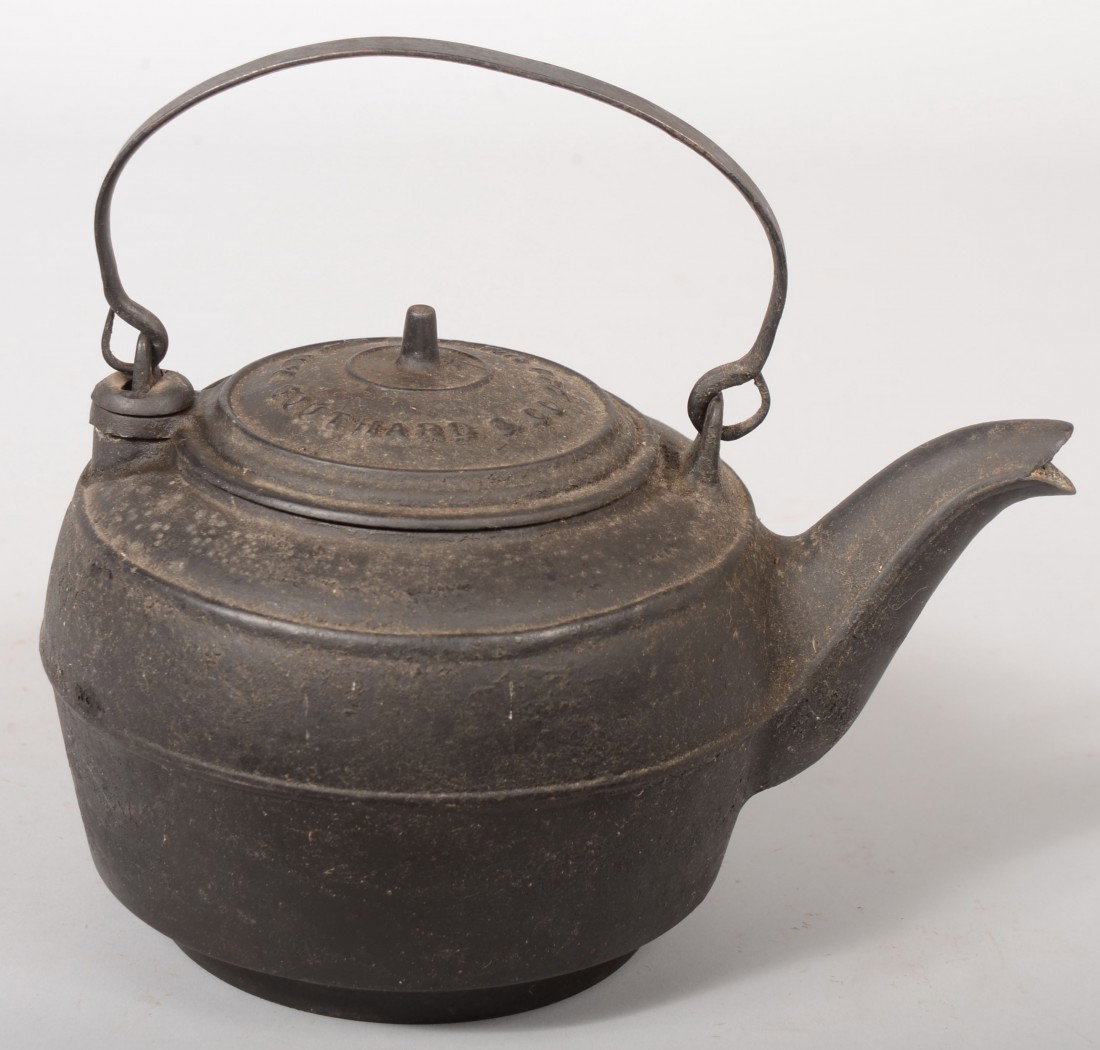 Cast Iron Hot Water Kettle. Marked on hinged lid: : Cast Iron Hot Water Kettle. Marked on hinged lid: " #7, Southard & Co., 231 Water St., NY." Ear tabs with wrought iron swing handle. 7 1/2"h. X 9"dia. Condition: Good with use wear.