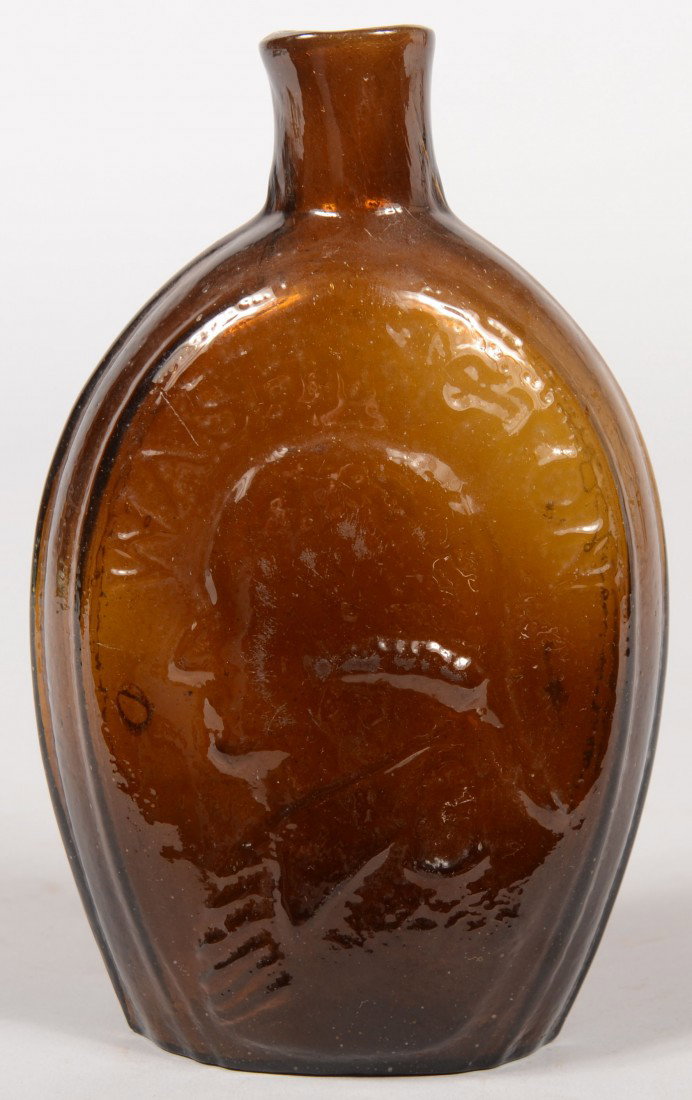 Amber Glass Washington/Jackson Historical Portrait: Amber Glass Washington/Jackson Historical Portrait Pint Flask, left facing busts of Washington on obverse and Jackson on reverse, Keene, Marlboro St., heavy medial rib, plain lip and pontil mark, (McK