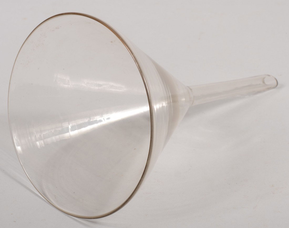 Large Colorless Blown Flint Funnel. Diagonal cut s: Large Colorless Blown Flint Funnel. Diagonal cut spout tip. 13"l. X 71/2"dia. Condition: Good, no damage.