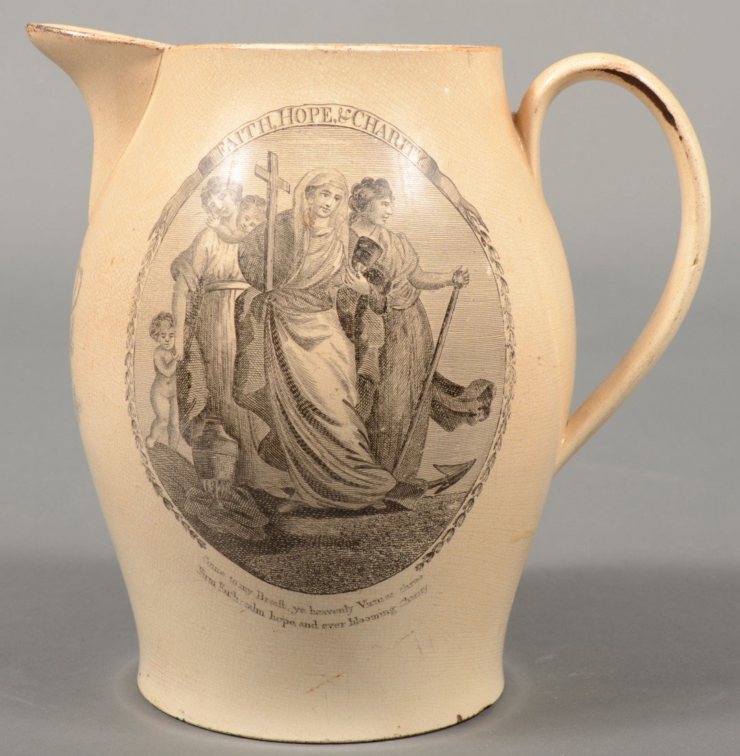Liverpool Pitcher. Off white body with applied loo: Soft Paste China Liverpool Pitcher with applied loop handle and black transfer decorations: "Religion" on banner over oval image of a woman lifting a chalice and "Faith, Hope and Charity" on a banner 