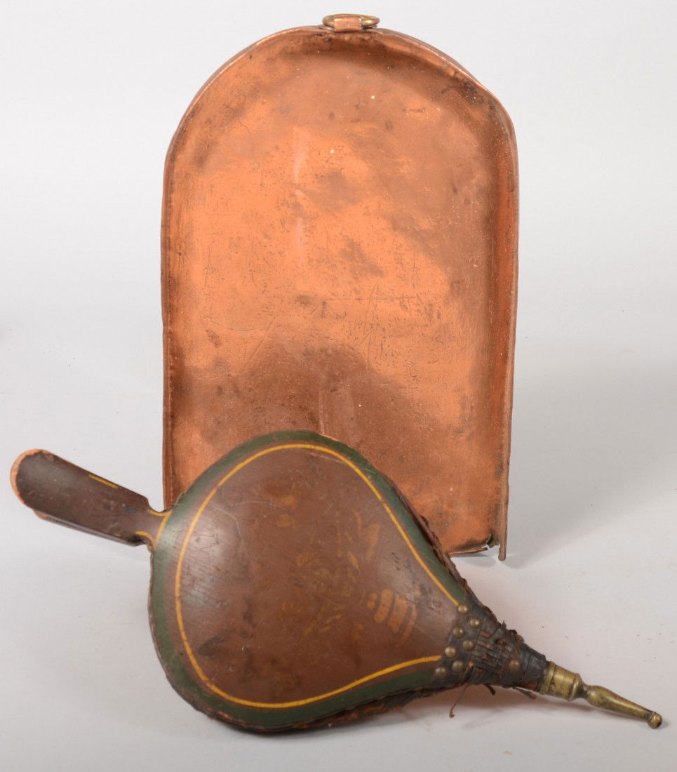 Two Hearth Tools. Copper ash pan with a half round: Two Hearth Tools. Copper ash pan with a half round end and hanging ring on long open ended shallow pan. Unmarked. 16"l. X 10 1/4"w. Along with a wood and leather bellows with stencil decorated top and