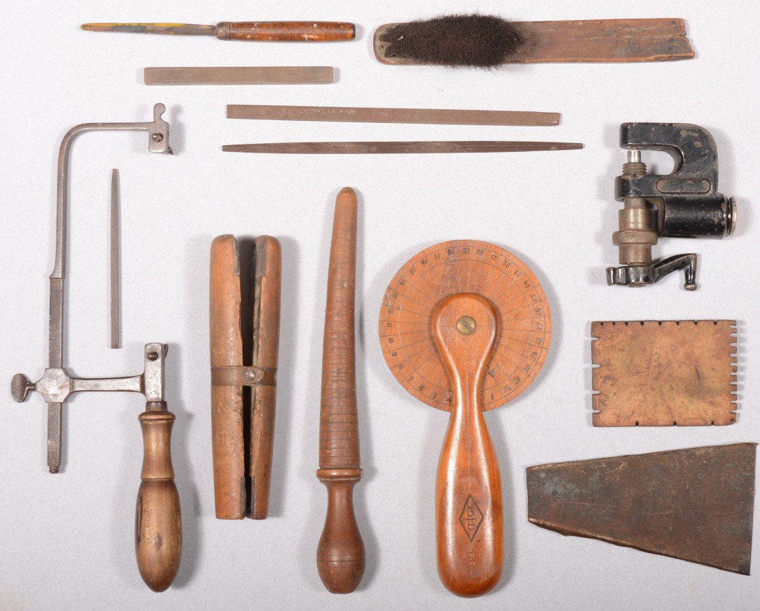 Twelve Piece Group of Bench Tools. A wood measurin: Twelve Piece Group of Bench Tools. A wood measuring wheel, frame saw (no blade), wood ring sizer, die punch vise, and related small hand tools. Condition: Good with use wear.