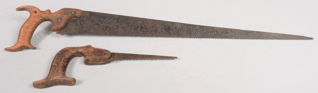 Two Compass Saws. Open wooden grips. Unmarked. 27 : Two Compass Saws. Open wooden grips. Unmarked. 27 3/4"l. and 11 1/2"l. Condition: Good with use wear.