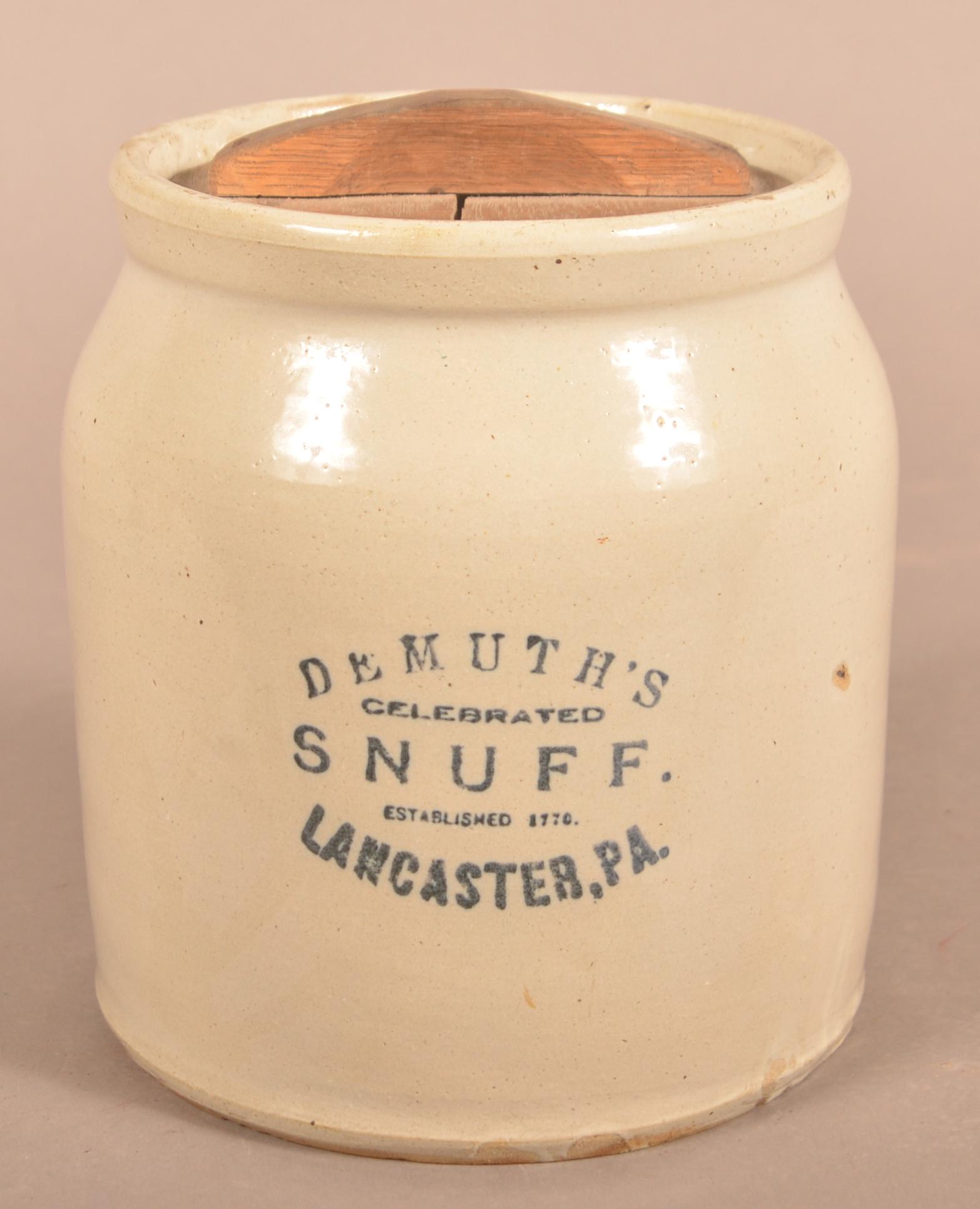 Demuth's Snuff Lanc., PA Stoneware 1-Gallon Crock.: Demuth's Snuff Lancaster, PA. Stoneware 1-Gallon Crock. Stenciled in dark blue "Demuth's Celebrated Snuff Established 1770, Lancaster, Pa." 8"h.
