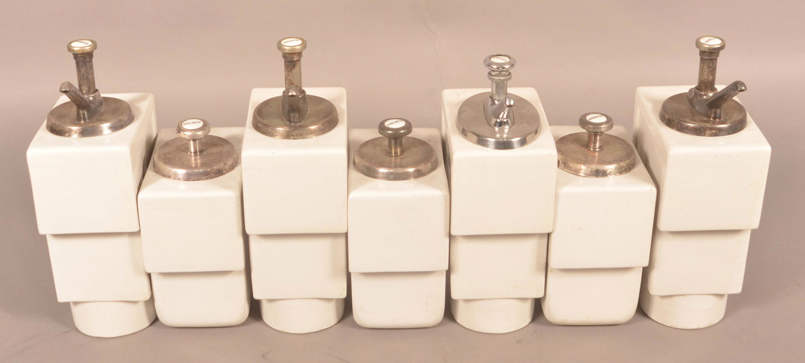 Seven White Enameled Cast Iron Soda Dispensers. (1 of 5)
