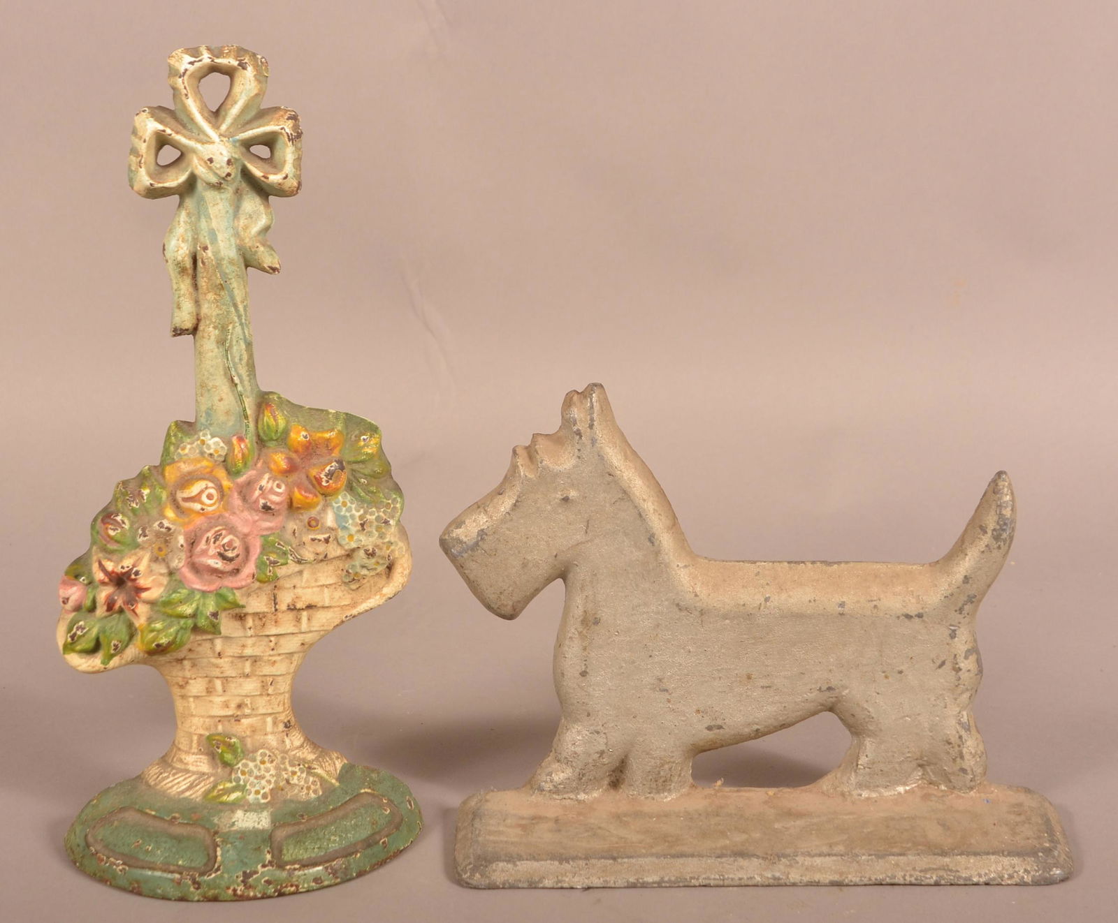 Cast Iron Basket of Flowers and Scotty Dog Doorstops. (1 of 2)