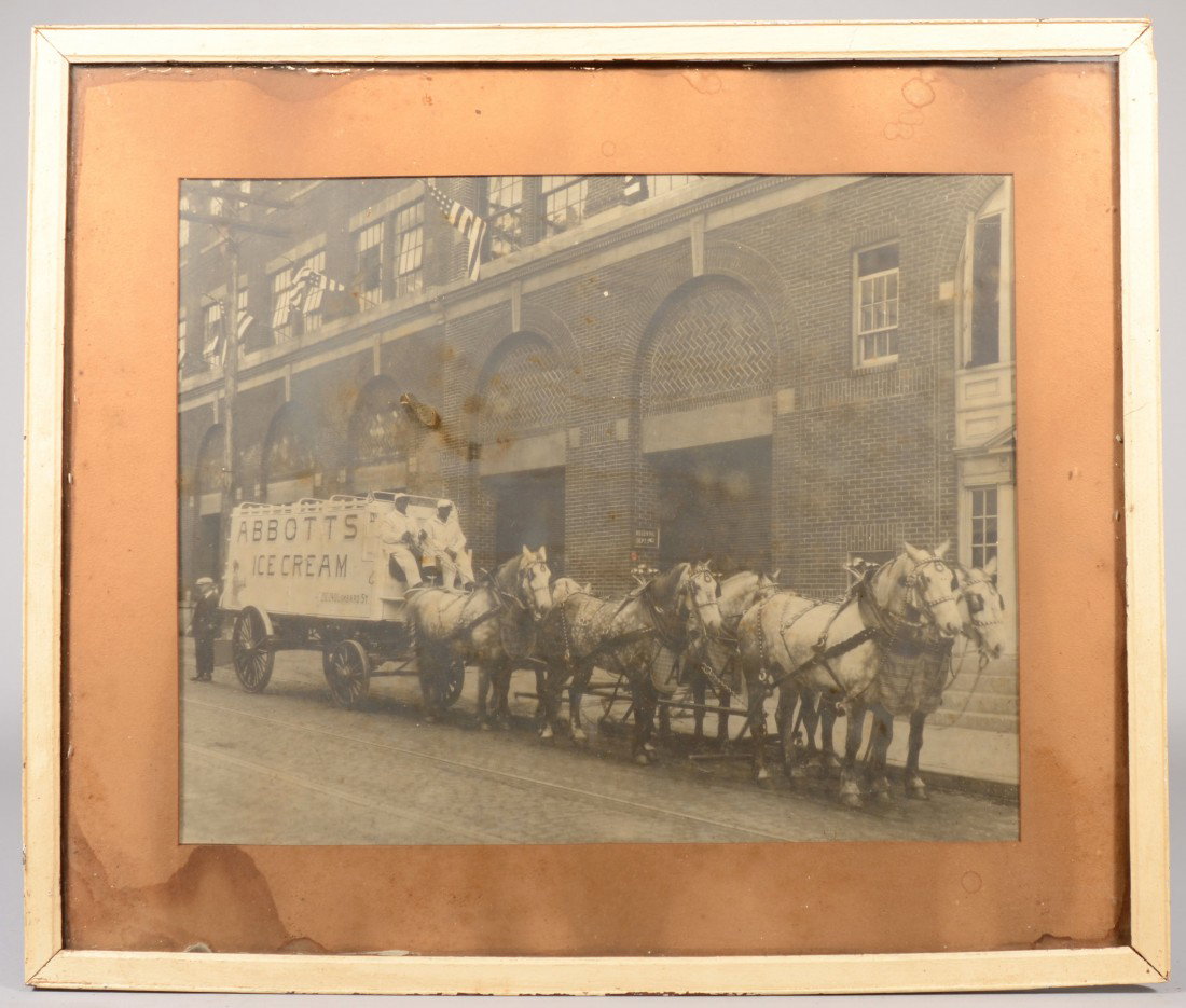 Large B&W Photograph of Abbotts Ice Cream Wagon. S: Large B&W Photograph of Abbotts Ice Cream Wagon. Showing a six horse team of dappled grays with monogrammed bibs and two white uniformed black drivers. Image matted and mounted in a white strip frame.