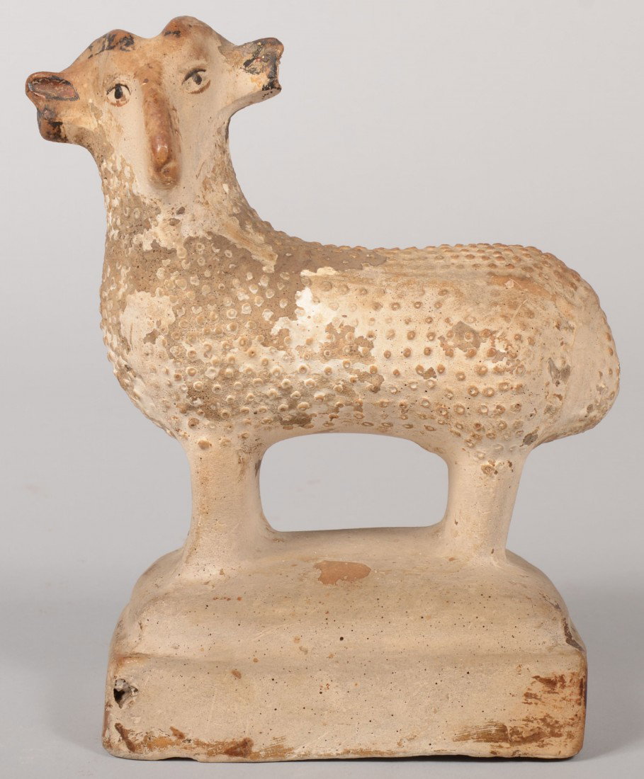 Early Hollow Cast Chalk Ram on Base. Knobby body d: Early Hollow Cast Chalk Ram on Base. Knobby body decoration. Black paint to horns, ears and eyes. 8"h. X 7 1/4"l. Condition: End of left horn/ear off. Tight blind crack at front rear leg, top of base.