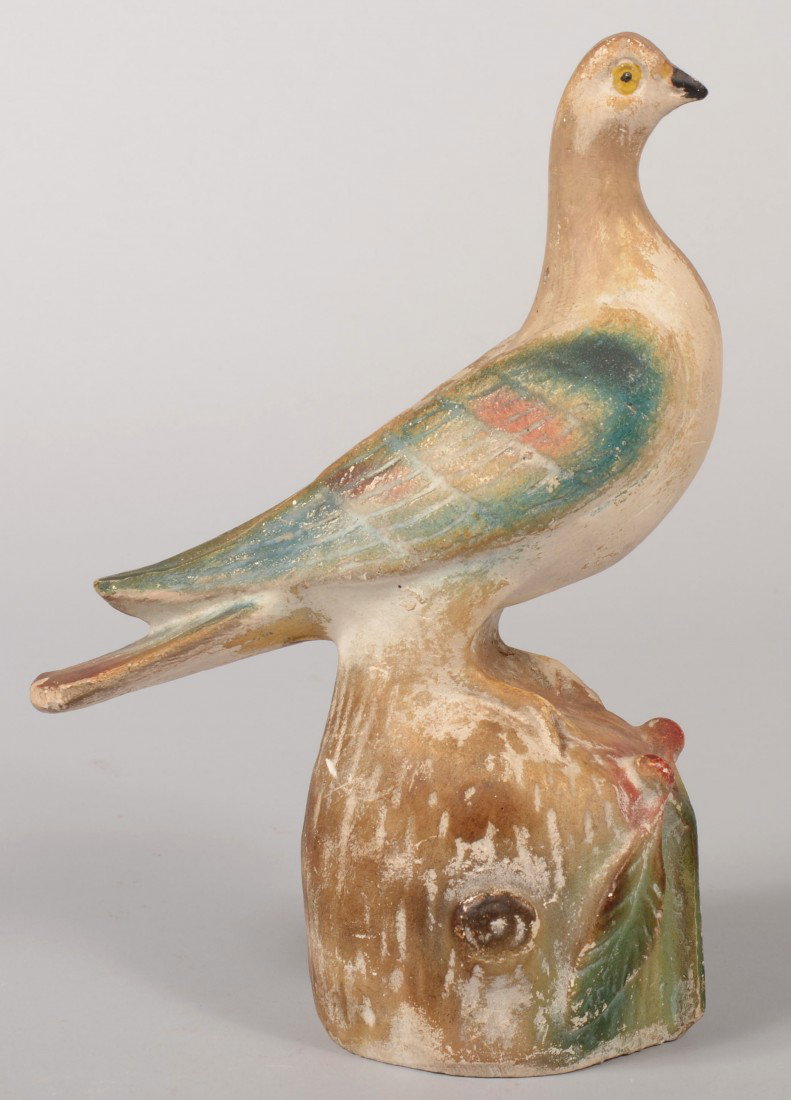 Cast Chalk Dove on Base. Hollow with sealed base. : Cast Chalk Dove on Base. Hollow with sealed base. Polychrome paint decoration to head, wings, and base. Base as a log section with cherries and leaves. 10 3/4"h. Condition: Good with age wear to paint