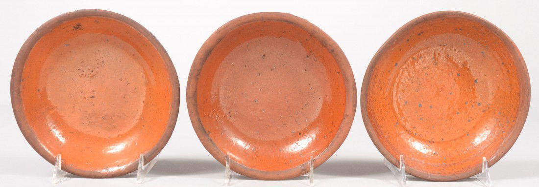 Three Redware Dishes or Shallow Bowls. 7 1/2"dia.: Three Redware Dishes or Shallow Bowls. 7 1/2"dia. Condition: Two have two small chips on rim.