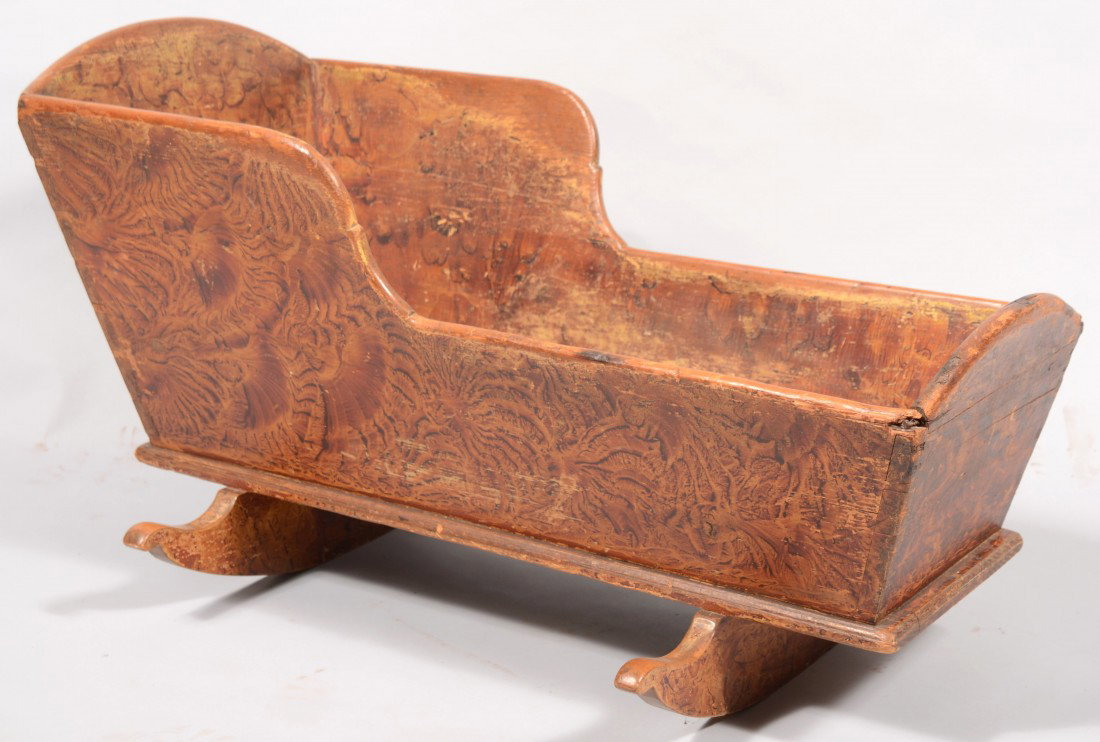 Pennsylvania Mid. 19th Century Softwood Cradle wit: Pennsylvania Mid. 19th Century Softwood Cradle with marbleized paint decoration. Dovetailed construction with molded baseboard and cheese-cutter rockers. 21 1/2"h x 23w x 39" long. Condition: good wit