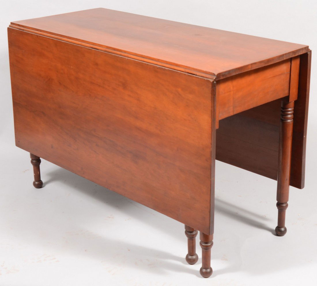 Pennsylvania Sheraton Cherry Six-leg Gate-leg Drop: Pennsylvania Sheraton Cherry Six-leg Gate-leg Drop-leaf Table with turned legs. 29 1/4"h x 44 1/2"l x 20"w, each leaf measures 20 1/2"w. Condition: good.