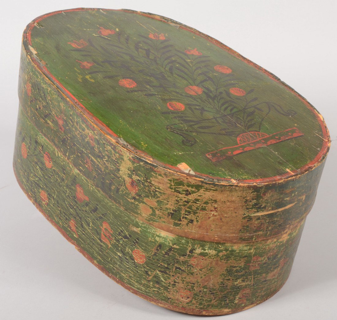 Green Painted Oblong Banded Wood Bride's Box. Red : Green Painted Oblong Banded Wood Bride's Box. Red and yellow floral decorations with black highlights and leaves. Reed strip lacing at lap joint. 8 1/8"h. X 19 1/4"l. X 12 1/2"w. Condition: 3" piece m