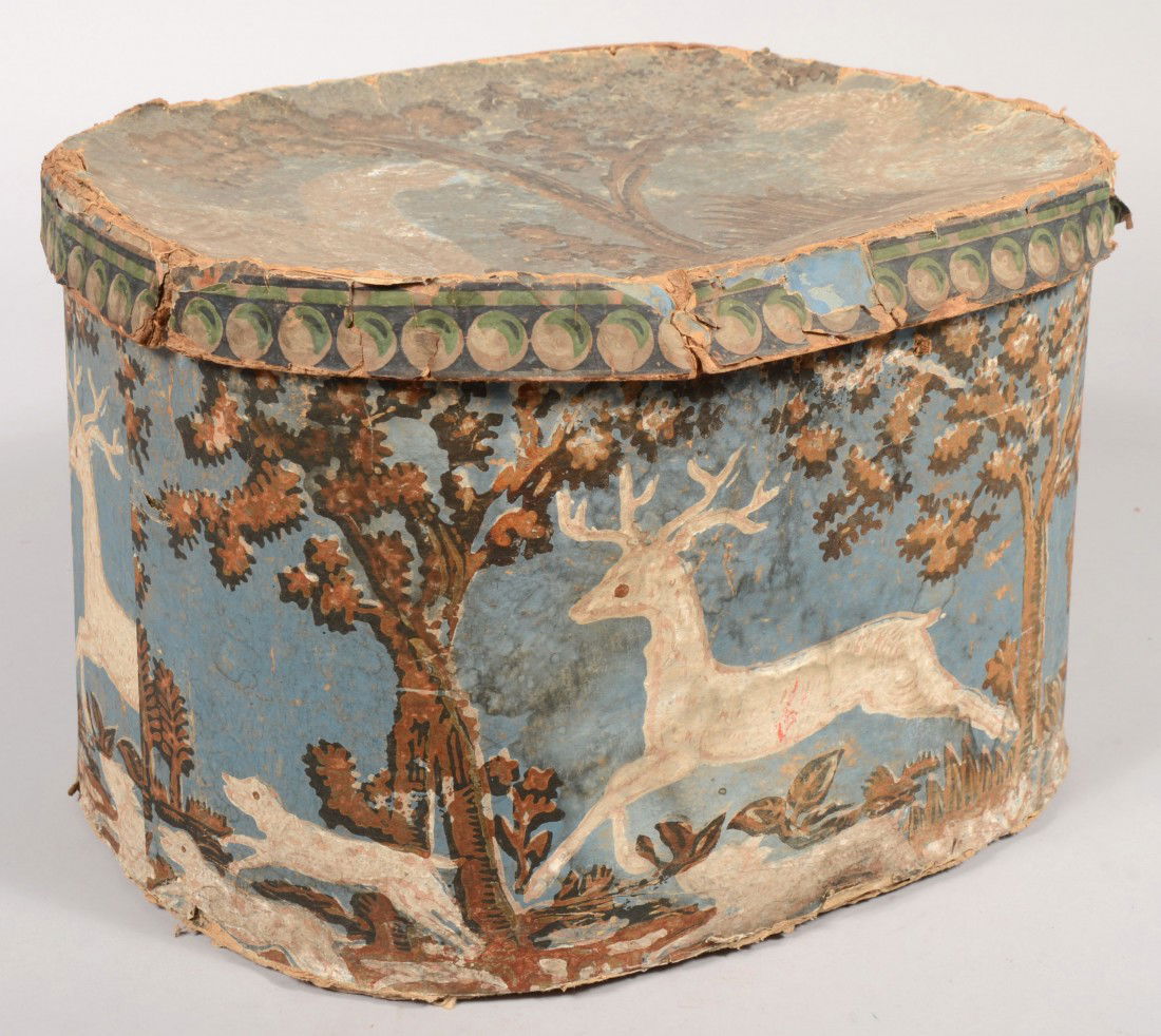 Decorative Oblong Wall Paper Covered Cardboard Hat: Decorative Oblong Wall Paper Covered Cardboard Hat Box. Large banded body and lid with hounds chasing a stag on body and squirrels on the lid both in blue, brown, black and white colors. 10 3/4"h. X 1