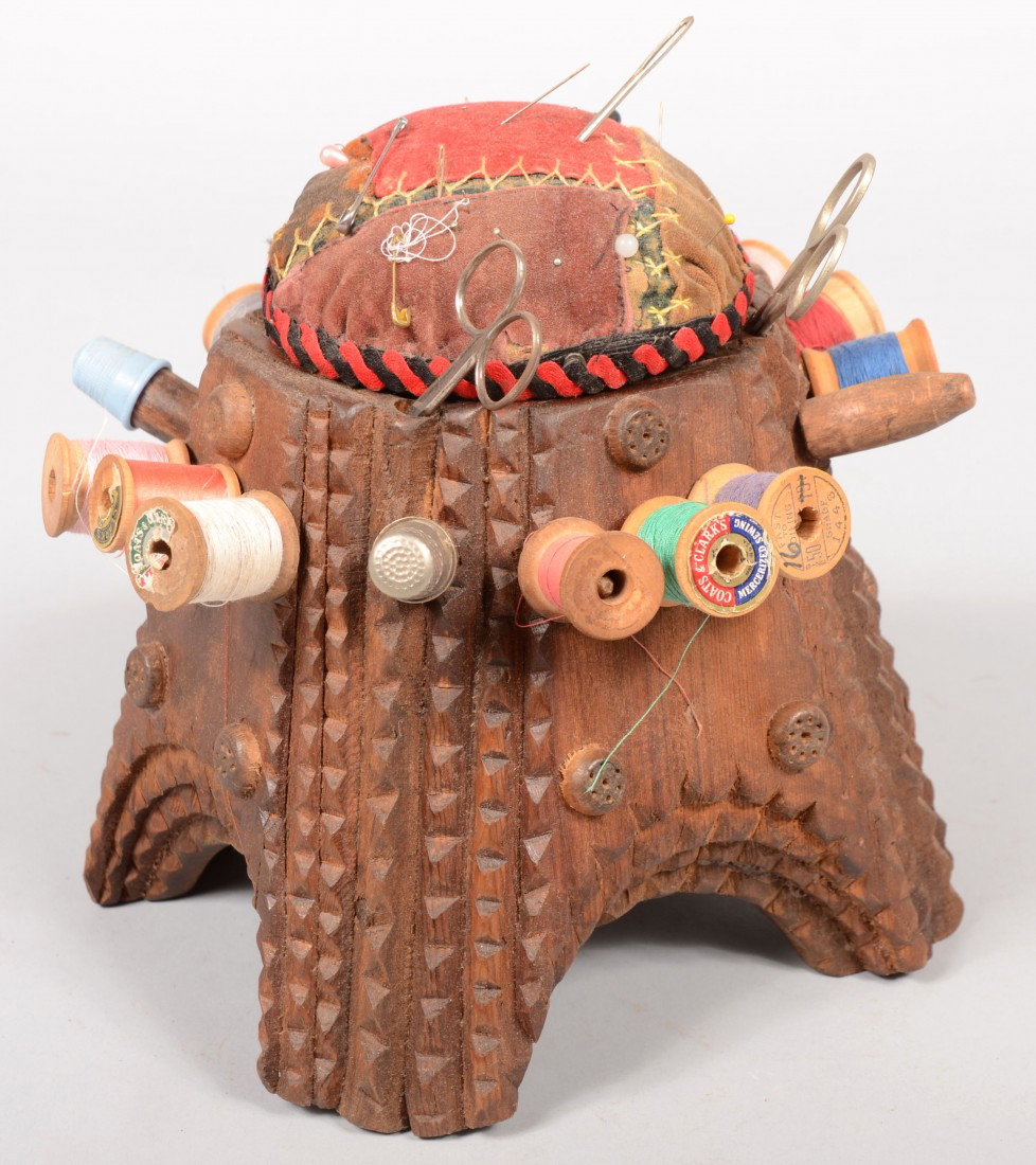 Four Sided Sewing Box Pyramid. Canted layered side: Four Sided Sewing Box Pyramid. Canted layered sides with arches dividing corner feet. Dowels surrounding box near top hold spools of thread and thimbles. Top surmounted by a hinged domed pin cushion c