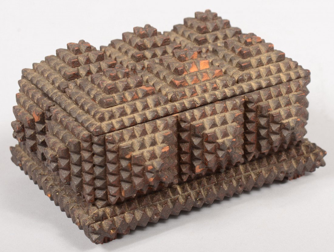 Chip Carved Tramp Art Trinket Box. The whole made : Chip Carved Tramp Art Trinket Box. The whole made of four layer pyramids. Six on hinged lid, three each to front and back and two each on ends. Opposing chip carving on base edge. Four chip carved fee