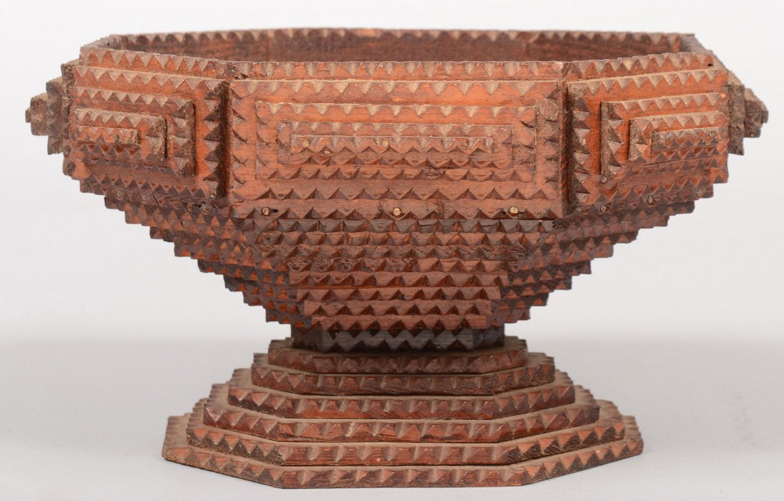 Open Oblong Octagonal Tramp Art Compote. Four laye: Open Oblong Octagonal Tramp Art Compote. Four layer pyramids around sides of dish with a nine layer tapered pedestal meeting a six layer raised base. 5 3/4"h. X 9 3/4"w. X 8"d. Condition: Good with us