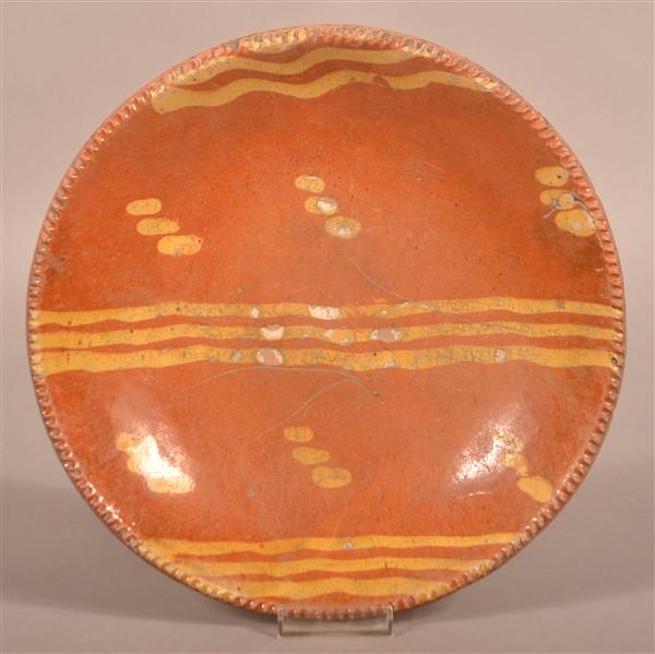 Pennsylvania 19th C. Slip-Decorated Redware Plate. (1 of 2)