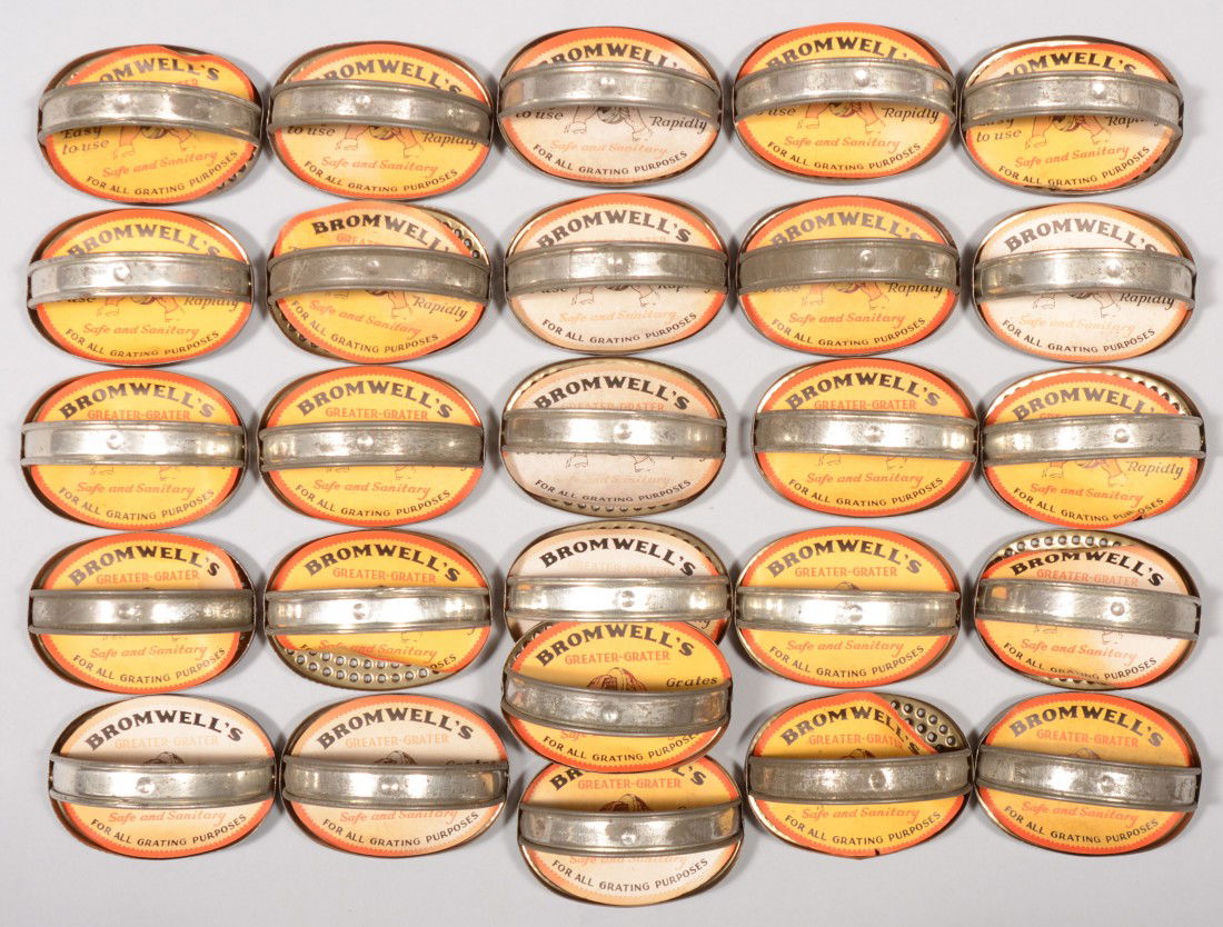 Bromwell's Hand Graters, Twenty Six Piece Group. O: Bromwell's Hand Graters, Twenty Six Piece Group. Oval tin plated sheet iron hand graters with handle and paper label insert. 2 1/4"h. X 4"l.