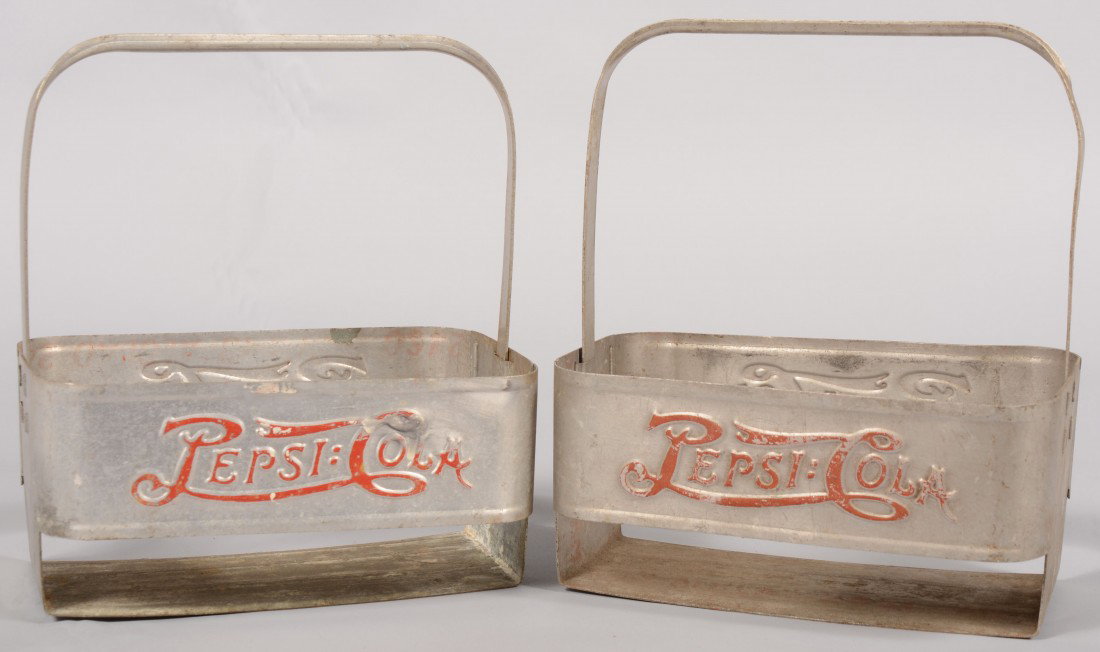 Two Pepsi Bottle Carriers. Both aluminum with embo: Two Pepsi Bottle Carriers. Both aluminum with embossed red painted labeling on sides and adjustable handles. Made for six bottles. 8 3/8"l.