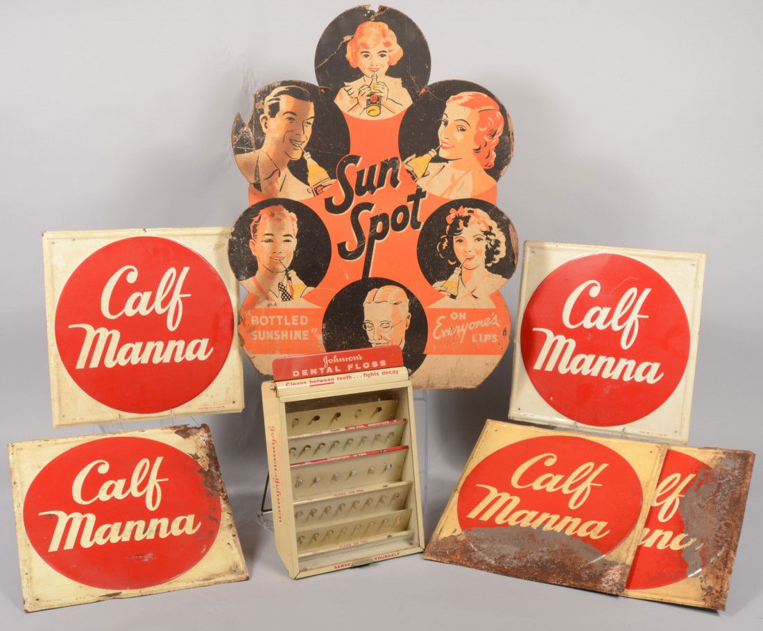 Three Advertising Pieces. A painted metal "Johnson: Three Advertising Pieces. A painted metal "Johnson & Johnson Dental Floss" case with glass door. 14"h. X 9 3/4"w.; a printed cardboard display for "Sun Spot" orange soda. 27 1/2"h. X 21"w.; five red a