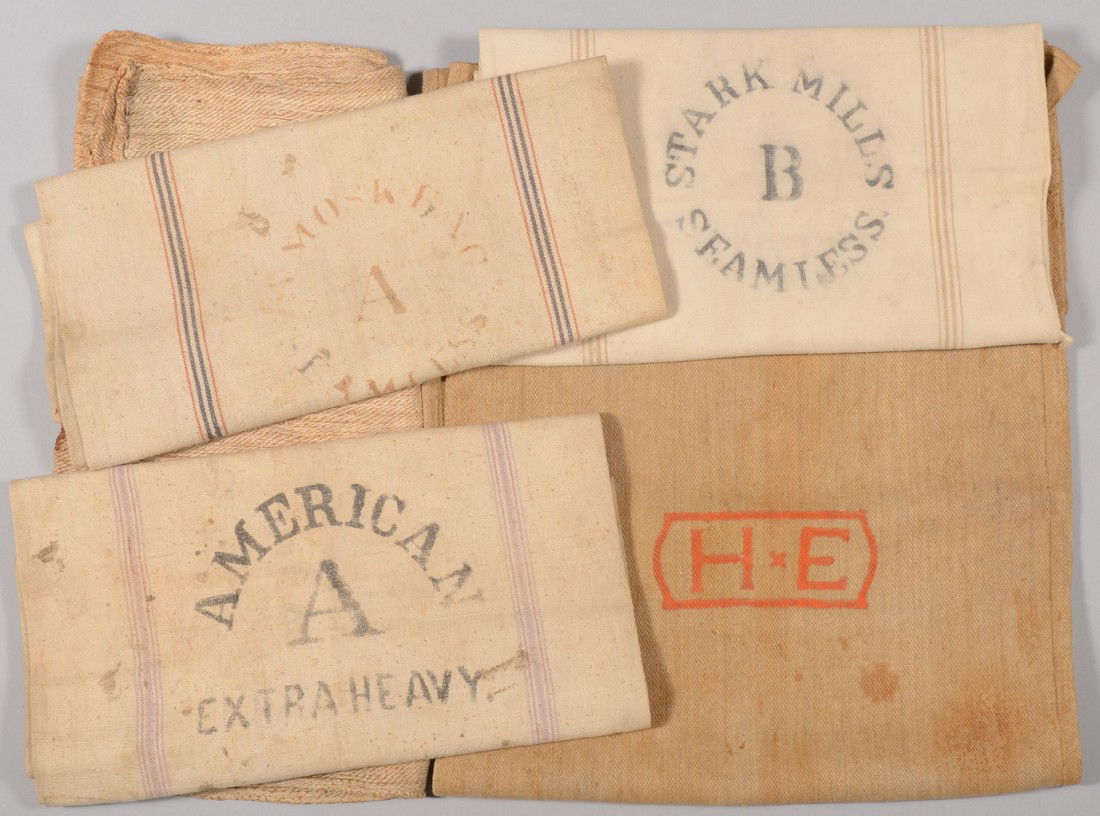Group of Feed Bags. Two early twill weave linen ba: Group of Feed Bags. Two early twill weave linen bags, no marks, 44"l. X 23"w. and 51"l. X 22"w., one with stain, other clean; early twill woven linen bag with stamped orange tablet outline and "H*E" w