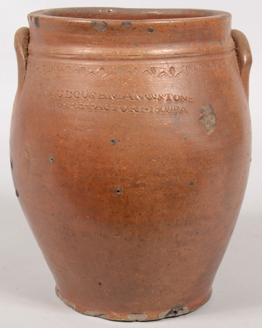 Ovoid Body Stoneware Storage Crock with Brown Glaz: Ovoid Body Stoneware Storage Crock with Brown Glaze. Applied crescent handles and shaped collar. Stamped with: "Paul*Cushman's*Stone Ware* Factory* 1809 PA." Intaglio design surround the base of the c