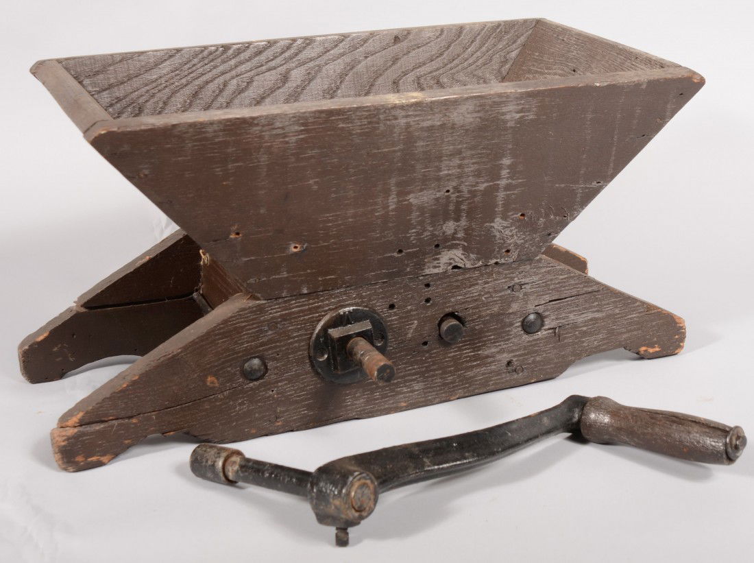 Wooden Housed Cast Iron Corn Sheller. Unmarked. Wo: Wooden Housed Cast Iron Corn Sheller. Unmarked. Wooden housing has top load wedge shaped hopper with side mount crank.