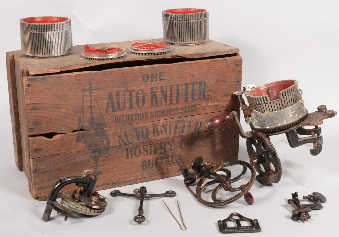 "Auto Knitter" Hosiery Knitting Machine. In origin: Auto Knitter Hosiery Knitting Machine. In original wood shipping crate with wrapped parts and instruction booklet. Appears to have not been sold or used. Marked: "The Auto Knitter Hosiery Co., Inc., B