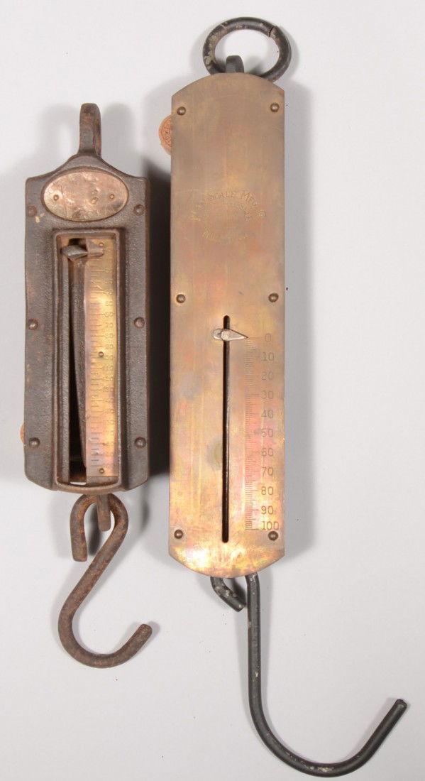 Two Brass Faced Iron Hanging Spring Scales. One ma: Two Brass Faced Iron Hanging Spring Scales. One marked: "Penn Scale Mfg. Co., Phila., PA." 0 - 100lbs. 19 1/2"l. Other marked: "Chatillions Iron Clad." 0 - 200lbs. 14"l.