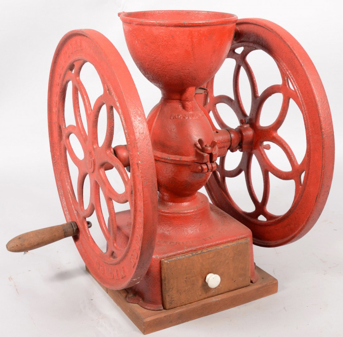 Red Painted Coffee Grinder with Double Flywheels.: Red Painted Coffee Grinder with Double Flywheels. Half spherical top load hopper(cover missing) on cast body with double open cast flywheels. Marked: "Enterprise Mfg. Co., Phila. Pa. Patd. dated 1898.