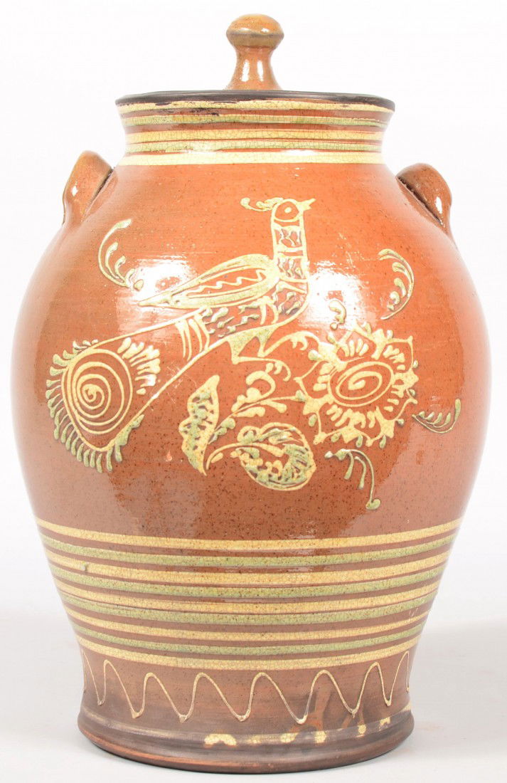 Large Covered Redware Jar with Inscription by Turt: Large Covered Redware Jar with Inscription by Turtle Creek. Marked by maker on bottom with "W. F. #210." Slip decoration in white and green of Distilfink with flowers and an inscription on reverse alo