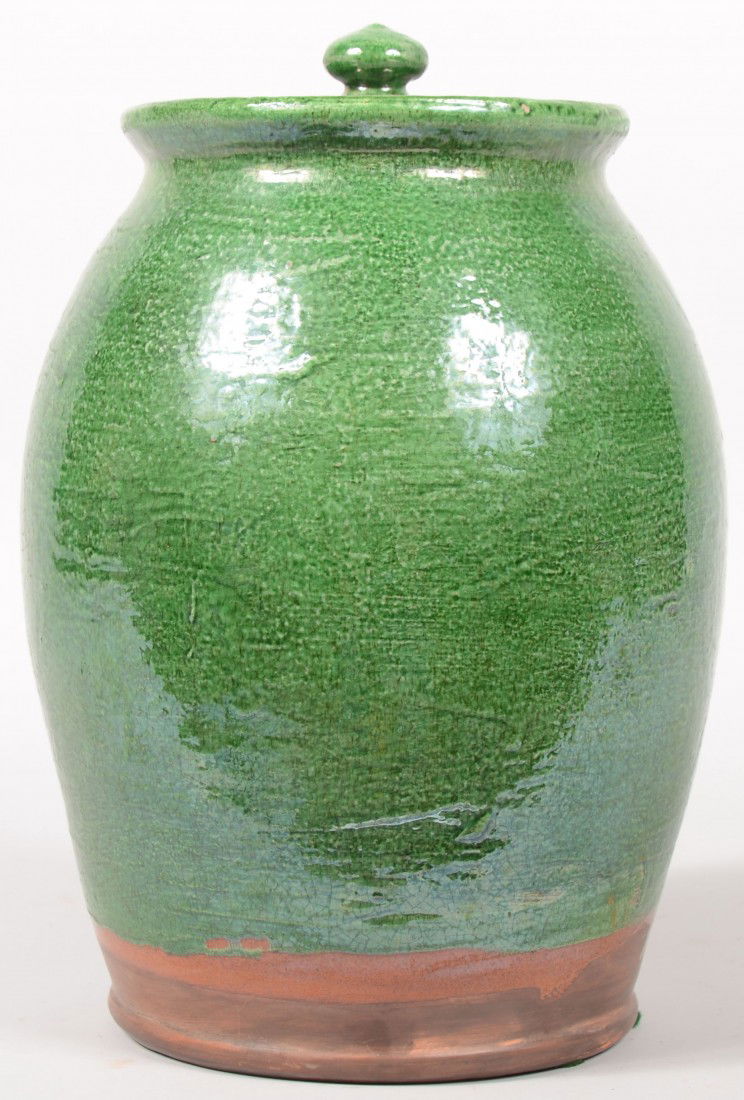 Large Turtle Creek Green Glazed Ovoid Redware Jar.: Large Turtle Creek Green Glazed Ovoid Redware Jar. Disk lid with knob and short flared neck. 14"h. X 8 1/2"dia.