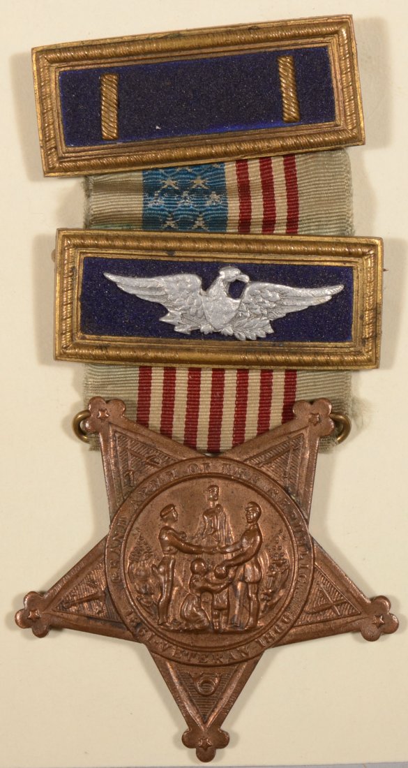 GAR Membership badge having (2) officer straps; one: GAR Membership badge having (2) officer straps; one with a Colonel eagle, the other with Lieut. bars, both on blue backgrounds. There is a "B" prefix serial number on the star.