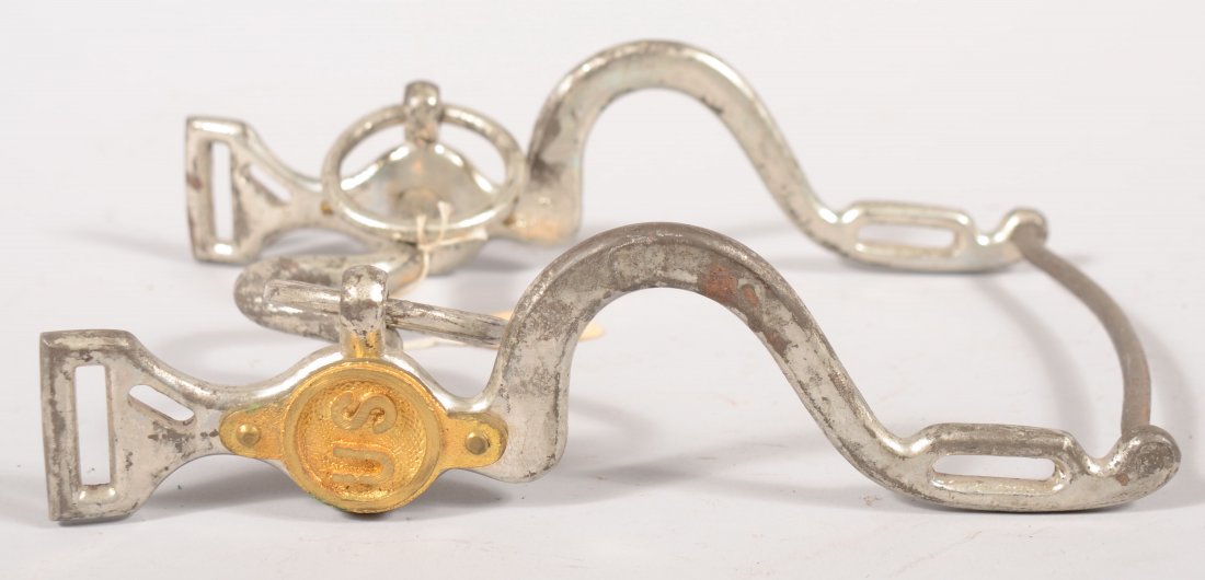 U.S. M1863 nickel plated Cavalry bit complete with: U.S. M1863 nickel plated Cavalry bit complete with its rings, the slobber bar, and both "US" bosses. Very good with much of the nickel remaining.