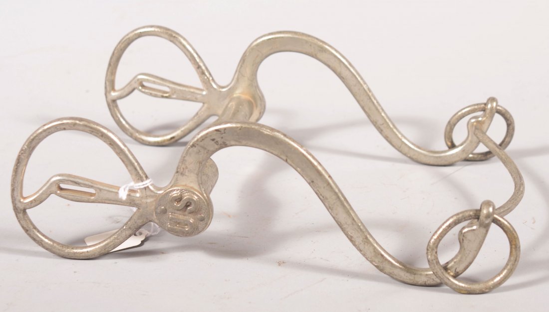 1874 U.S. Cavalry nickel plated curb bit designed : 1874 U.S. Cavalry nickel plated curb bit designed by Army Capt. William Shoemaker complete with its 2 lower rein rings, the slobber bar, and both "US" bosses. No curb chain. Fine condition having almo