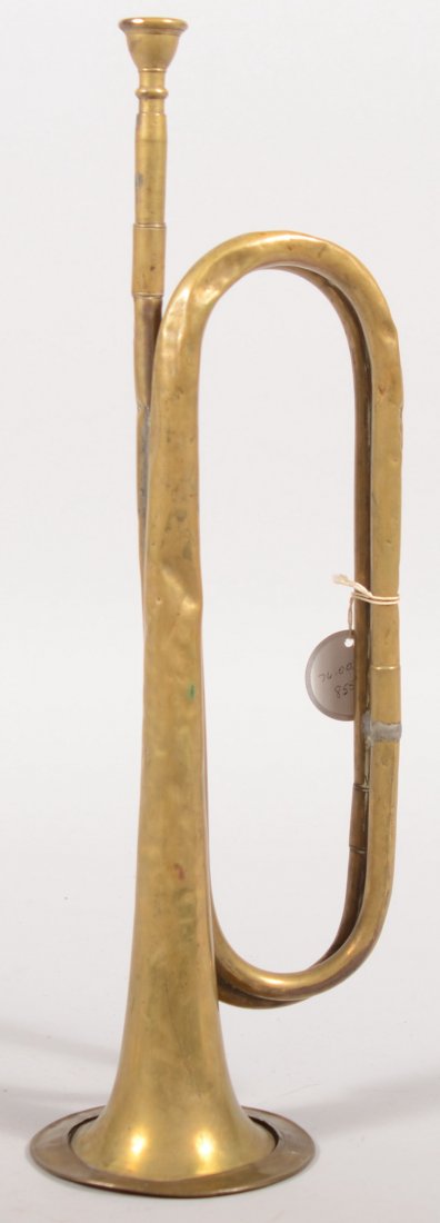 Double loop brass bugle 17-1/2" overall with mouth: Double loop brass bugle 17-1/2" overall with mouth piece. Multiple dents.