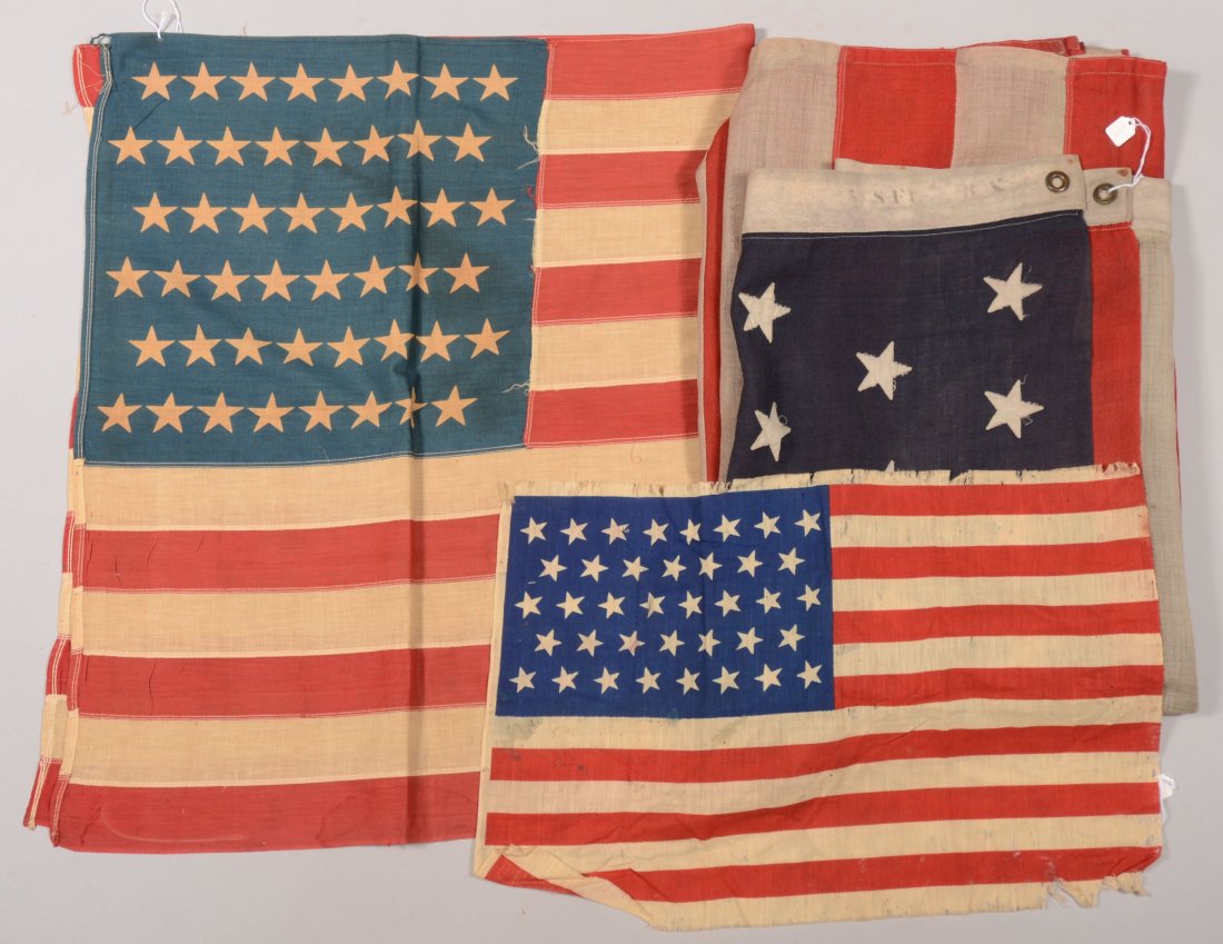 lot of (3) 50 star flags; one 5 ft. x 8 ft. with s: lot of (3) 50 star flags; one 5 ft. x 8 ft. with sewn stars and sewn stripes; one 27 in. x 49 in.; the other 15 in. x 22-1/2 in.
