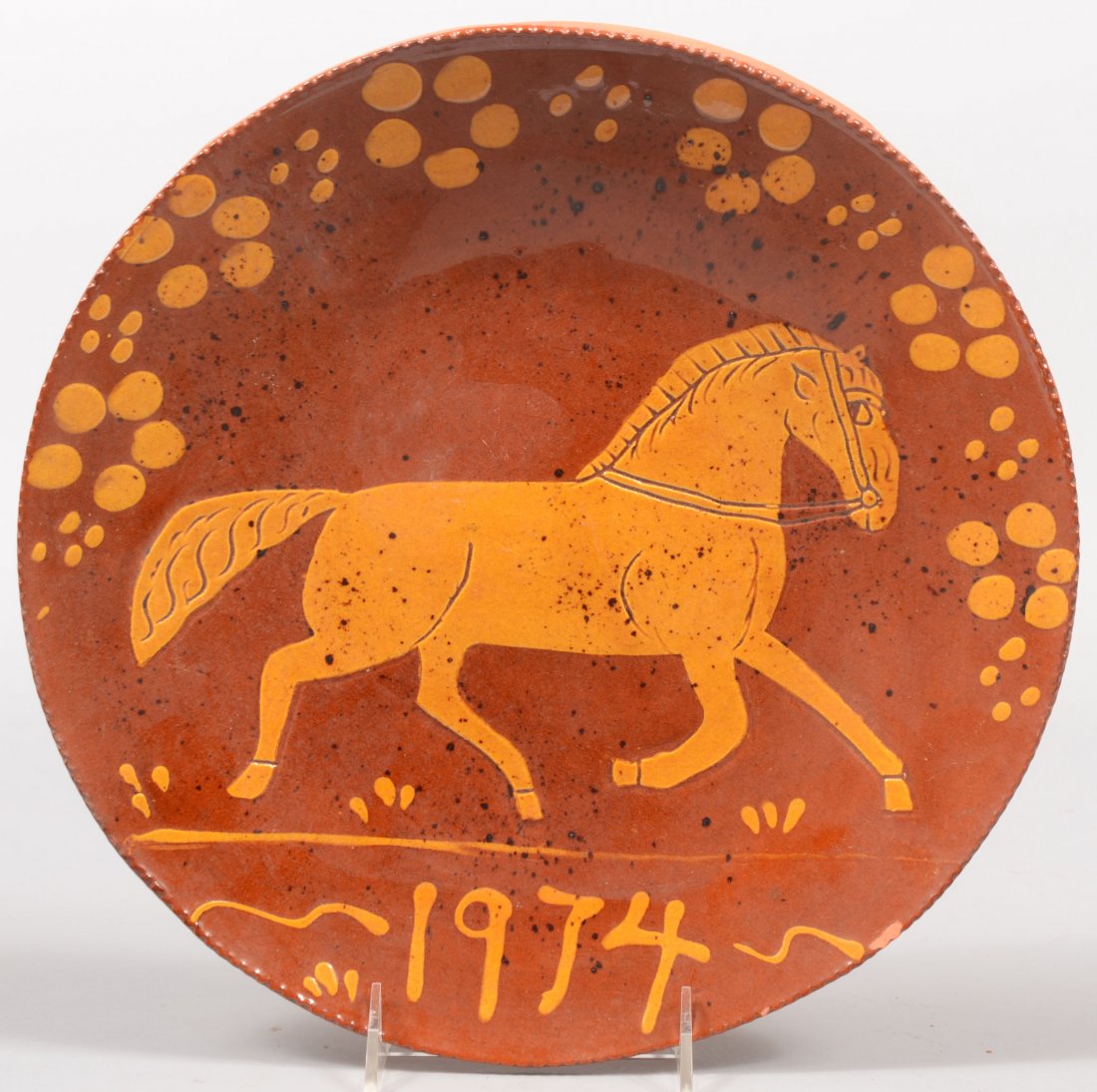 Contemporary Redware Charger by Lester Breininger.: Contemporary Redware Charger by Lester Breininger. Featuring a trotting horse and date, 1974. Coggled rim. Back marked: "L&B Breininger, Robesonia, PA., Augt. 16, 1974." 12 1/4"dia.