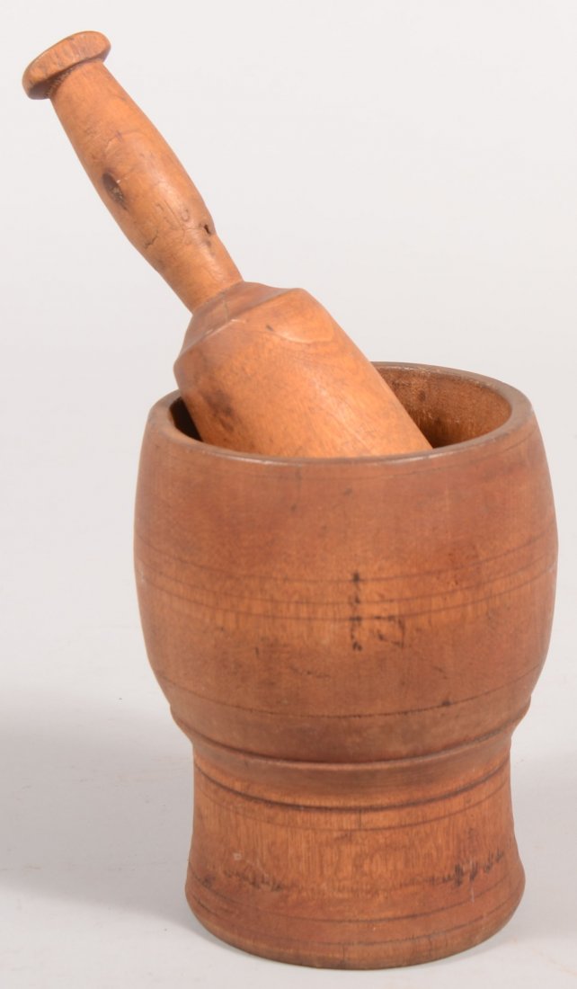 19th Century Turned Wood Mortar and Pestle, with i: 19th Century Turned Wood Mortar and Pestle, with incised rings on mortar, 6 1/2"h, pestle 9"long overall.