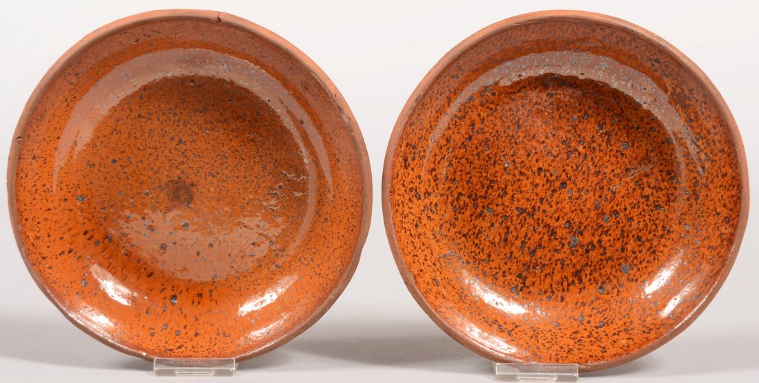 Two Pennsylvania 19th Century Redware Pottery Low: Two Pennsylvania 19th Century Redware Pottery Low Bowls with "tobacco spit" glaze. 7" diam.