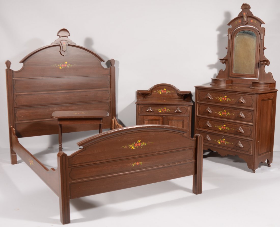 Late Victorian Four Piece Softwood Paint Decorated: Late Victorian Four Piece Softwood Paint Decorated Cottage Bedroom Suite. Brown comb grain ground with black striping and polychrome floral and foliate decoration. Set consists of a bed, bureau with t