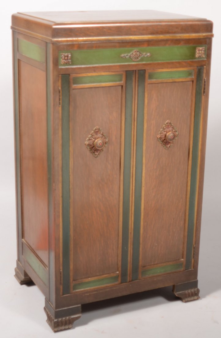 Depression Era Oak Case Vctor "Victrola" Floor Mod: Depression Era Oak Case Vctor "Victrola" Floor Model Record Player. Serial number VV 8-9 3018. Several vintage records accompany this piece. 46"h x 25 1/4"w x 19"d.